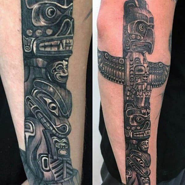 Male With Realistic Totem Pole Forearm Tattoo Black Ink Shaded