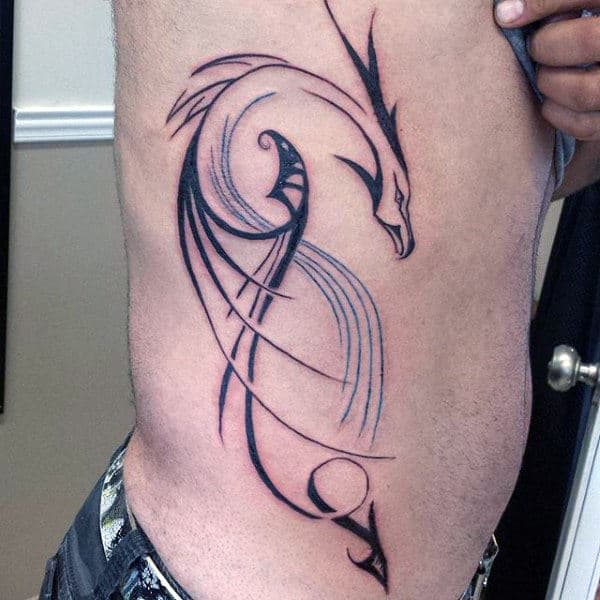 Male With Rib Cage Outline Tribal Dragon Tattoo