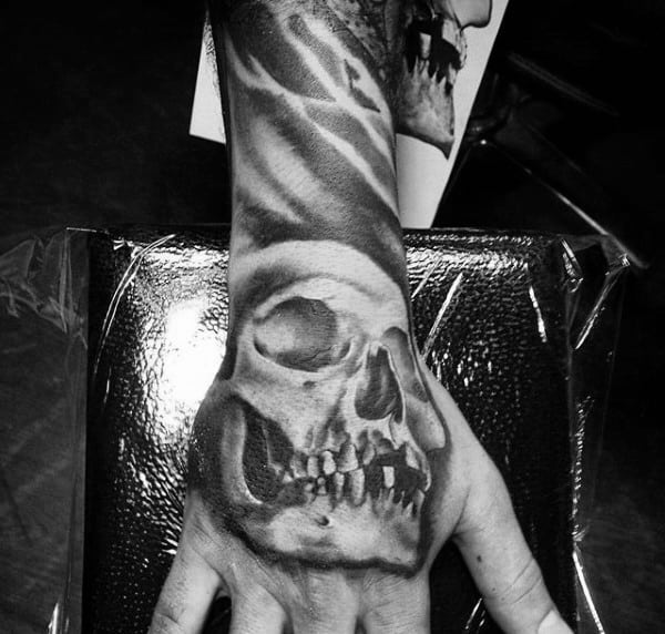 Male With Shaded Skull Tattoo On Hands