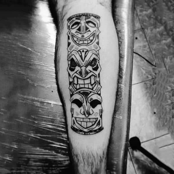 Male With Simple Modern Dark Totem Pole Forearm Tattoo
