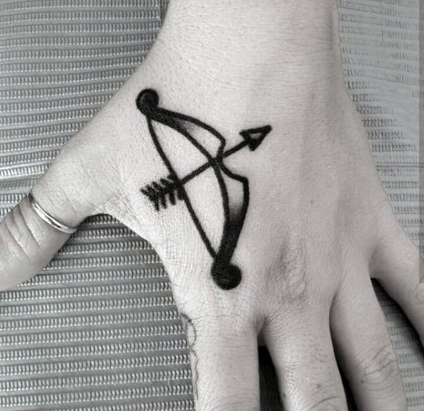 Male With Simple Traditional Bow And Arrow Hand Tattoo