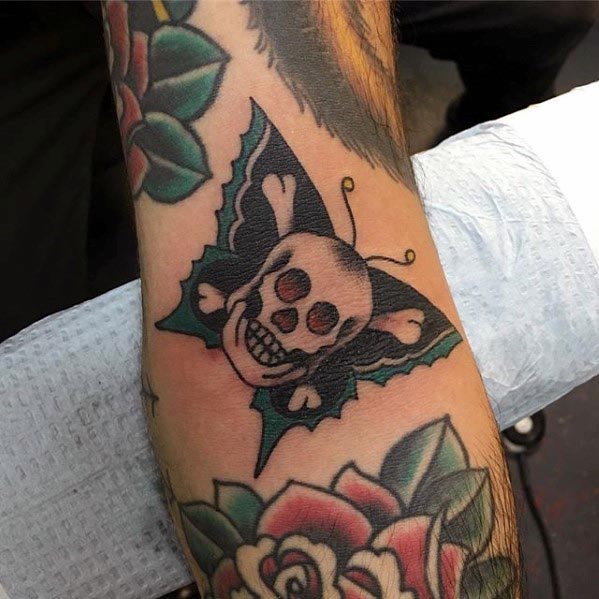 Male With Skull And Cross Bones Moth Traditional Inner Elbow Tattoo