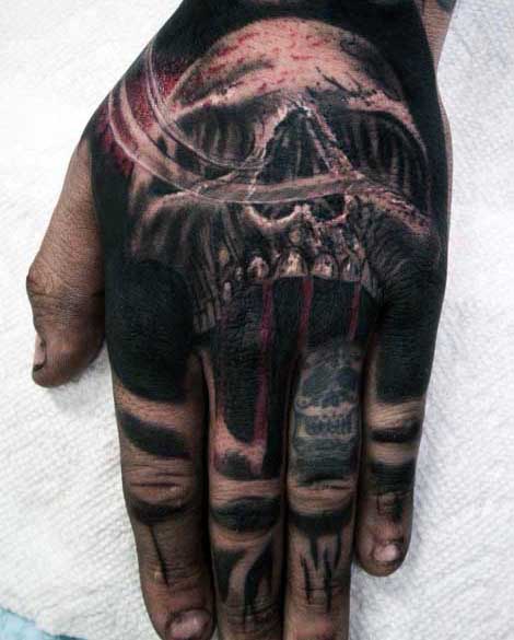 Male With Spade Skull Hand Tattoo