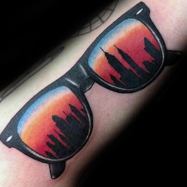Male With Sunset Skyline Building Tattoo In Sunglasses