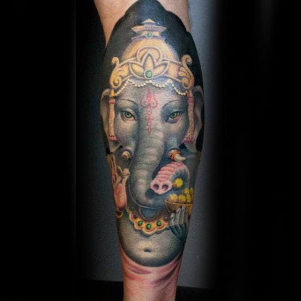 Male With Tattoo Sleeve Of Ganesha On Lower Legs
