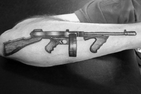 Male With Tommy Gun Tattoos