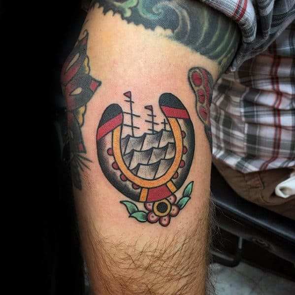Male With Traditional Horseshoe Sailing Ship Small Arm Tattoo