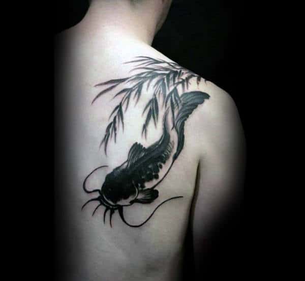 Male With Tree Branch Leaves Catfish Black Ink Shoulder Tattoo