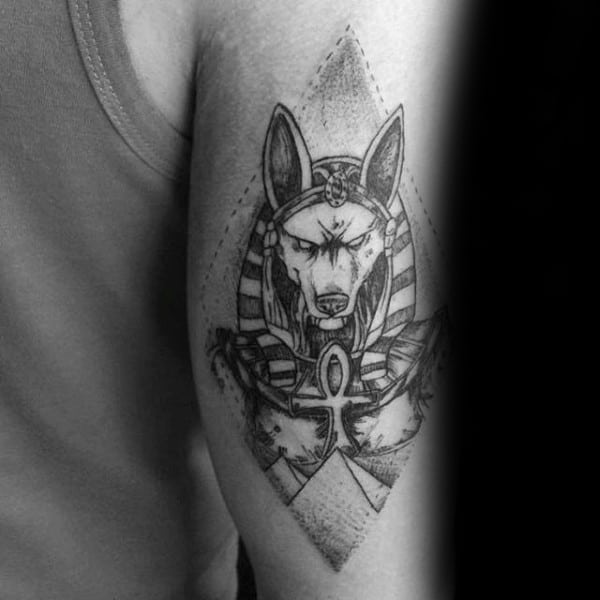 Male With Tricep Anubis Tattoo