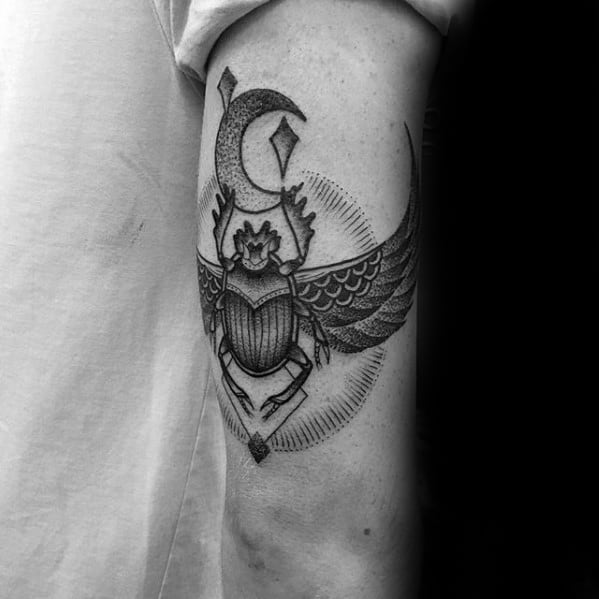 male with tricep back of arm scarab bettle tattoo