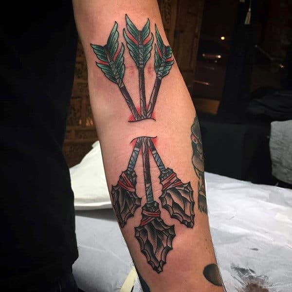 Male With Trio Of Arrowheads With Green Feathe Tattoo Forearms