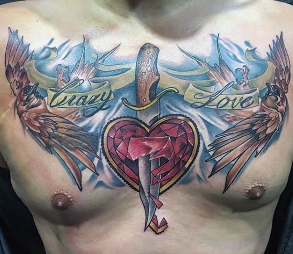 Male With Unique Chest Heart Dagger Tattoo