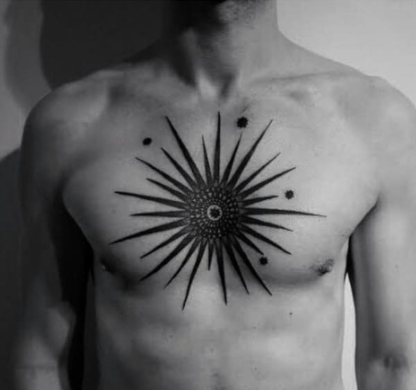 Male With Unique Star Chest Tattoo
