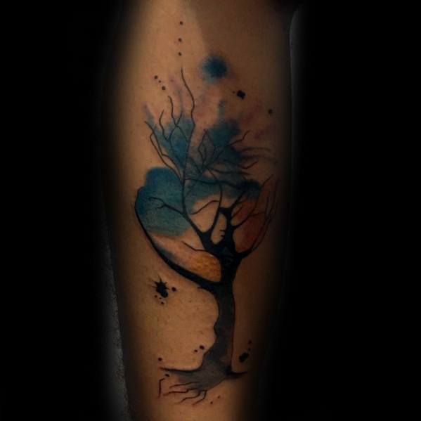 Male With Watercolor Tree Leg Tattoos