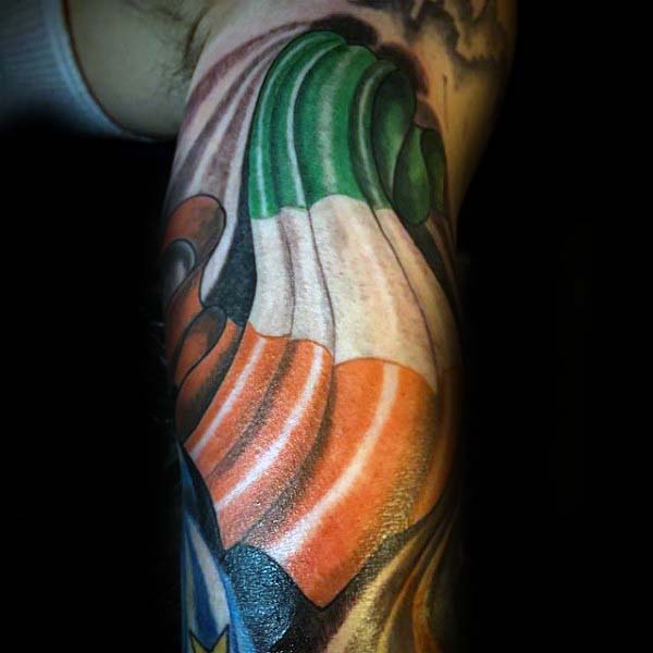 Male With Waving Irish Flag Tattoo On Arm