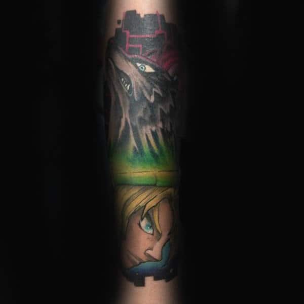 Male With Wolf And Zelda Tattoo On Forearm
