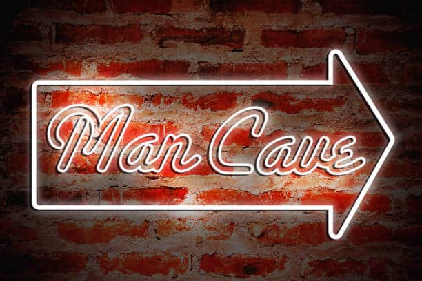 A neon sign that says “Man Cave.”