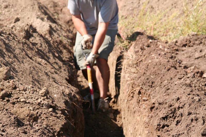 man-dig-using-shovel