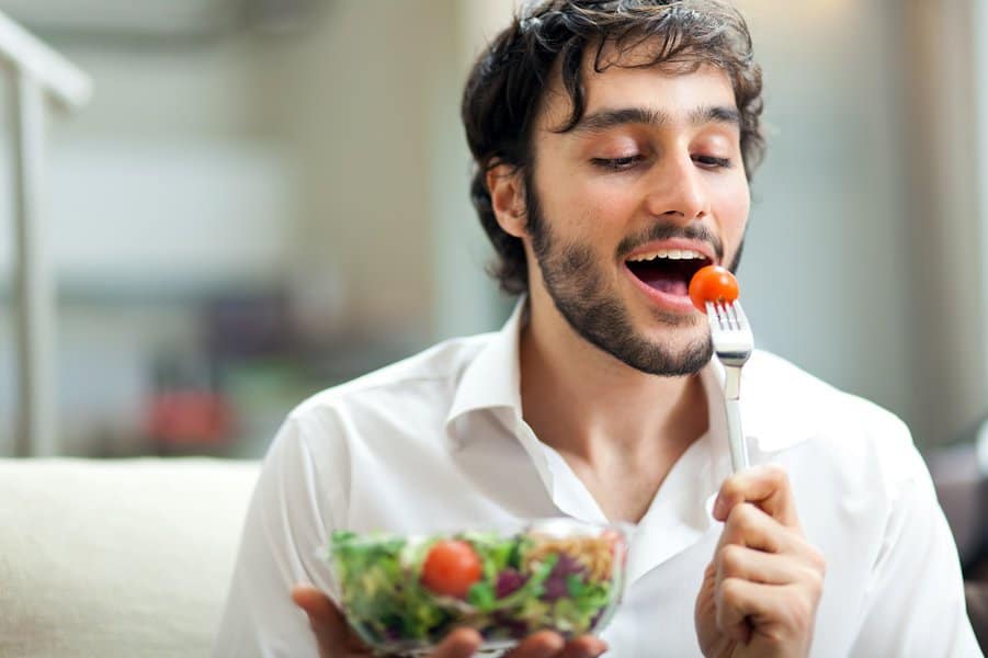 man eating a healthy salad