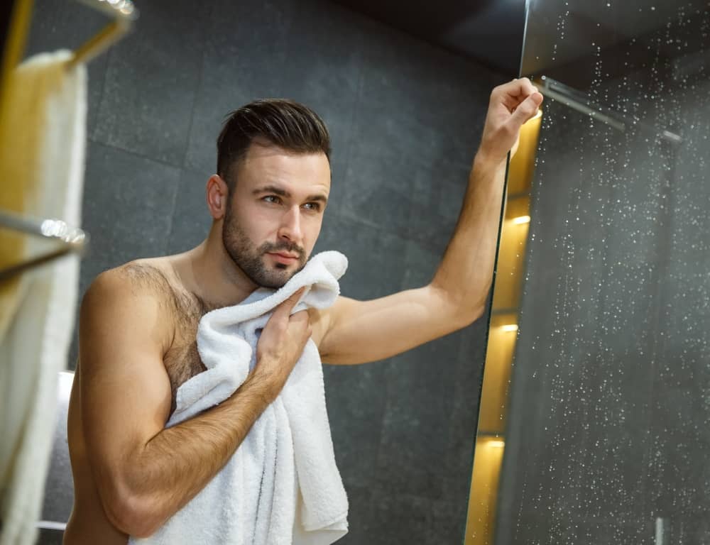 man having shower