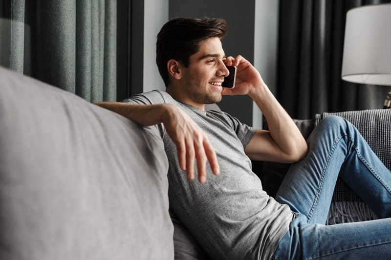 man smiling while on the call