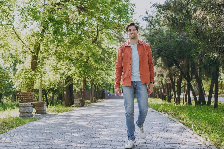 man walking on lawn outdoors