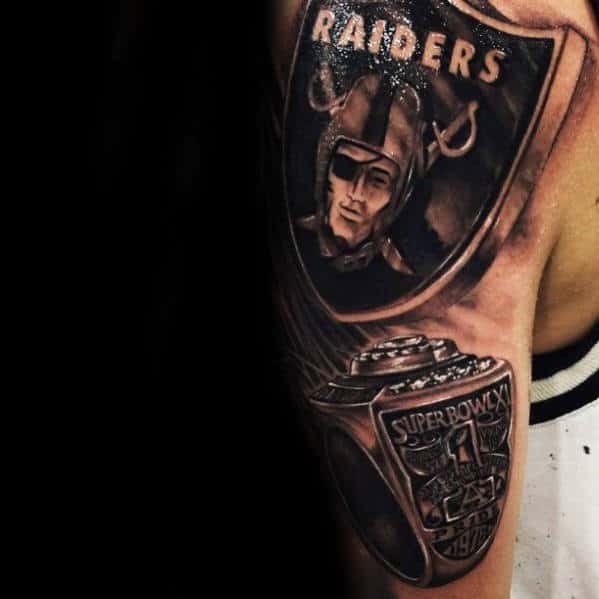 Man With 3d Oakland Raiders Arm Tattoo