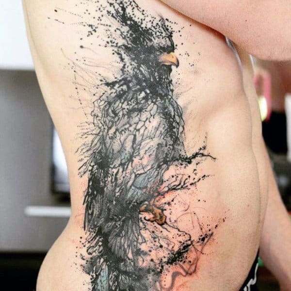 Man With Abstract Ink Splash Tattoo On Side