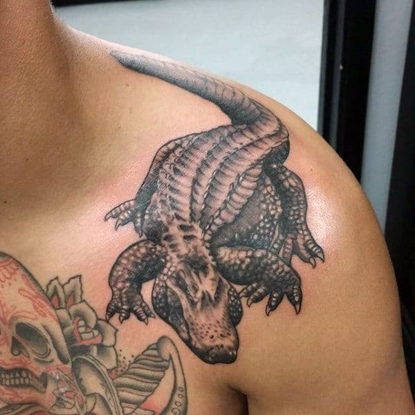 Man With Amazing Black Alligator Tattoo On Shoulders