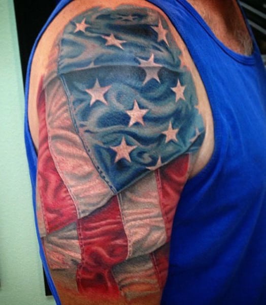 Man With American Flag Tribal Tattoos