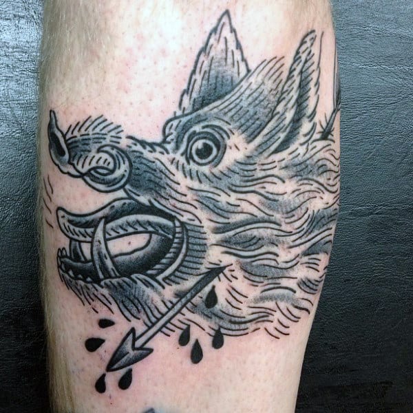 Man With Black And Grey Ink Boar Arrow Tattoo On Leg