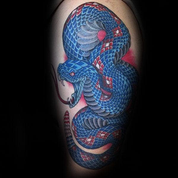 Man With Blue Rattlesnake Upper Arm Tattoo