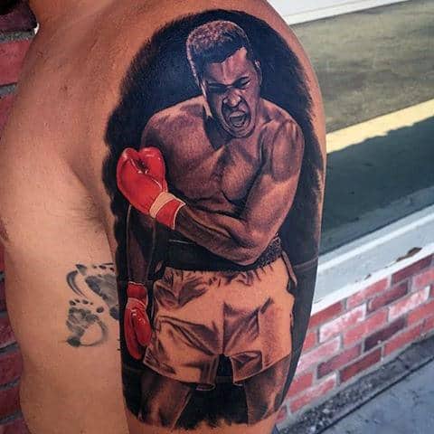 Man With Boxing Ring Tattoo On Arm