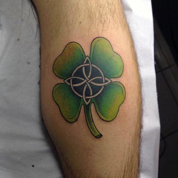 Man With Celtic Four Leaf Clover Tattoos On Back Of Leg Calf