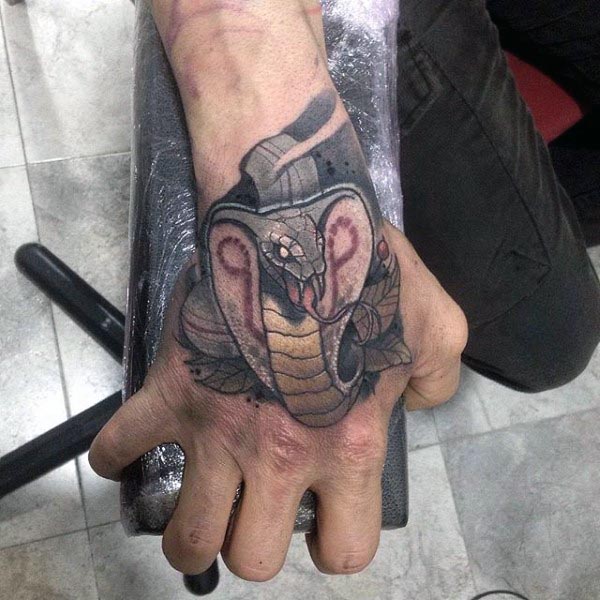 Man With Cobra Hand Tattoo Design