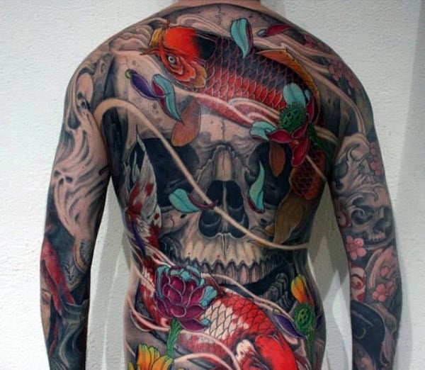 Man With Colorful Fish And Skull Tattoo Full Back