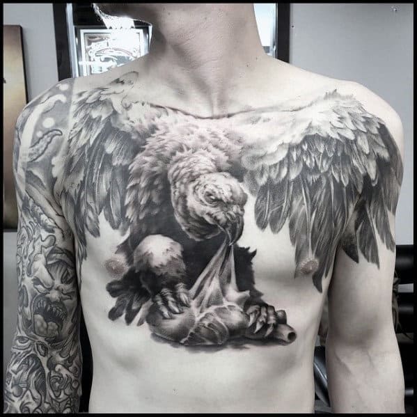 Man With Cool 3d Vulture Heart Chest Tattoo