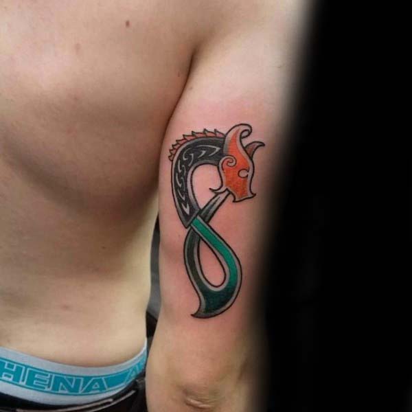 Man With Cool Irish Dragon Tricep Tattoo