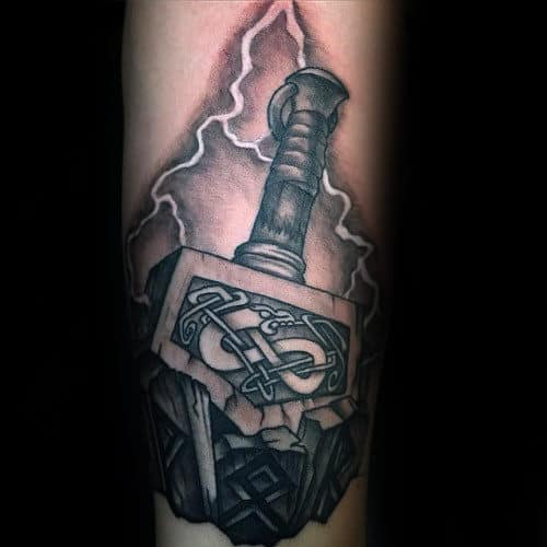 Man With Cool Mjolnir Arm Tattoo