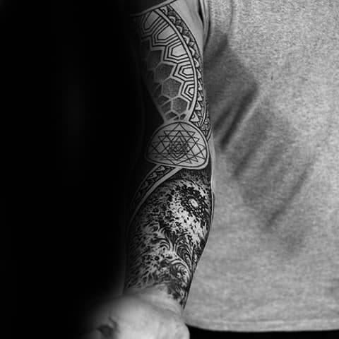 Man With Factal Sleeve Tattoo Design On Arms