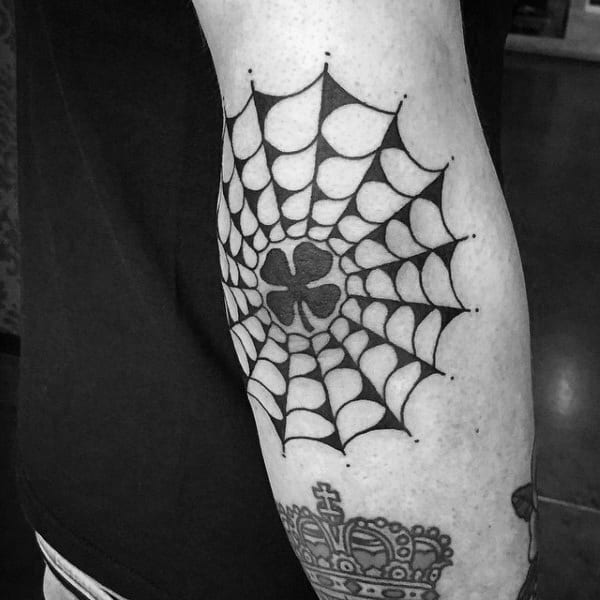 Man With Four Leaf Clover Black Ink Spider Web Tattoo On Back Of Elbow
