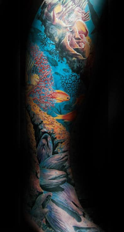Man With Ful Leg Sleeve Tattoo Of Underwater Coral Reef Design