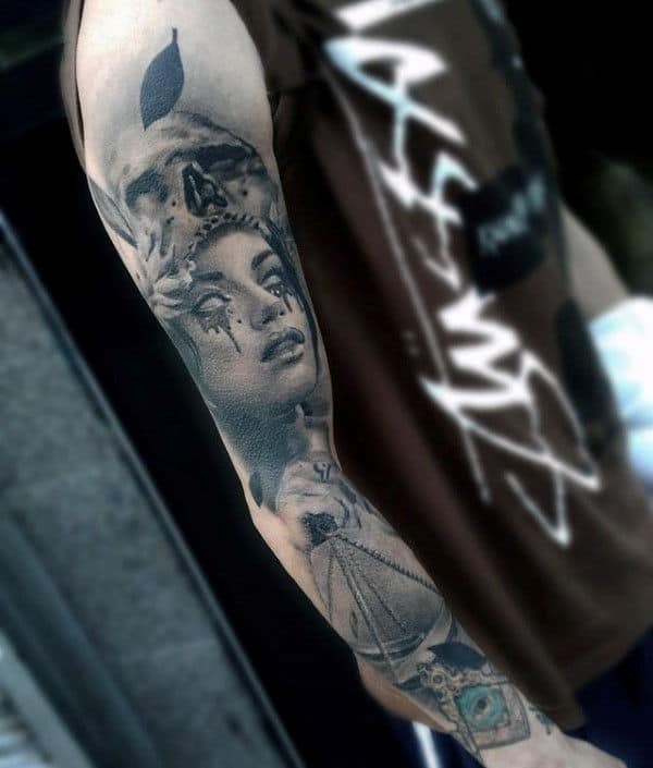 Man With Full Sleeve Libra Tattoo