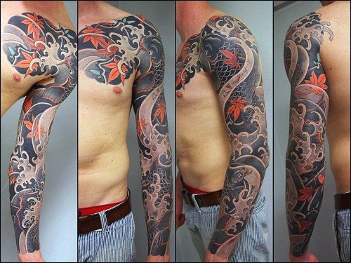 man-with-full-sleeve-tattoo-of-japanese-maple-leaf