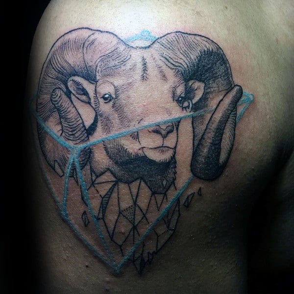 Man With Geometric Aries Ram Upper Arm Tattoo