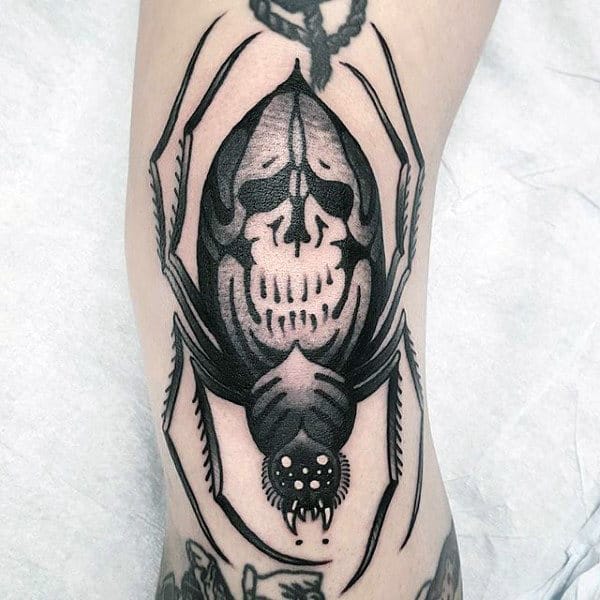 Man With Ghostly Spider Tattoo On Legs