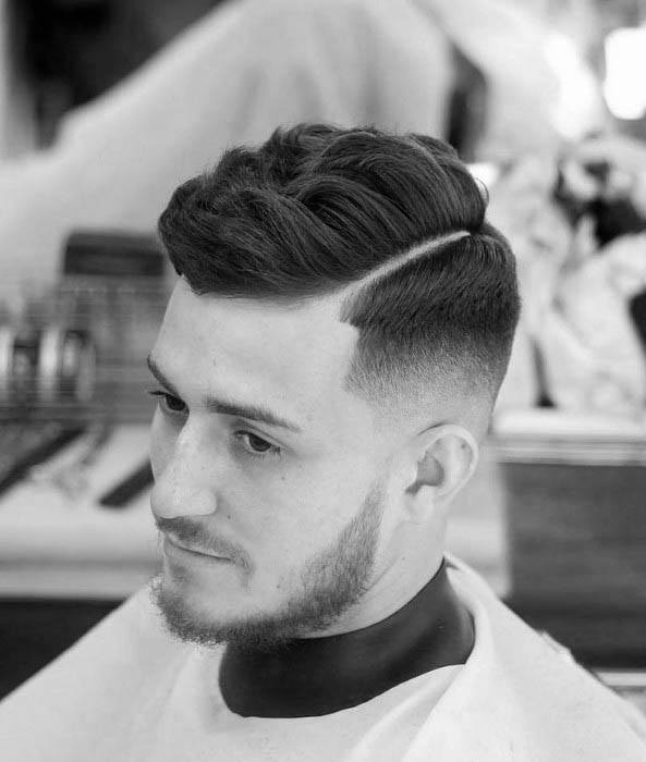 Man With Hard Part Low Fade Hairstyle