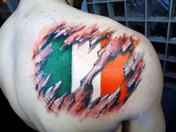 Man With Irish Flag Ripped Skin Shoulder Tattoo Design