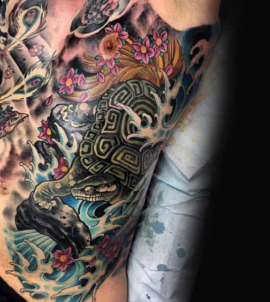 Man With Japanese Turtle Ribcage Tattoo