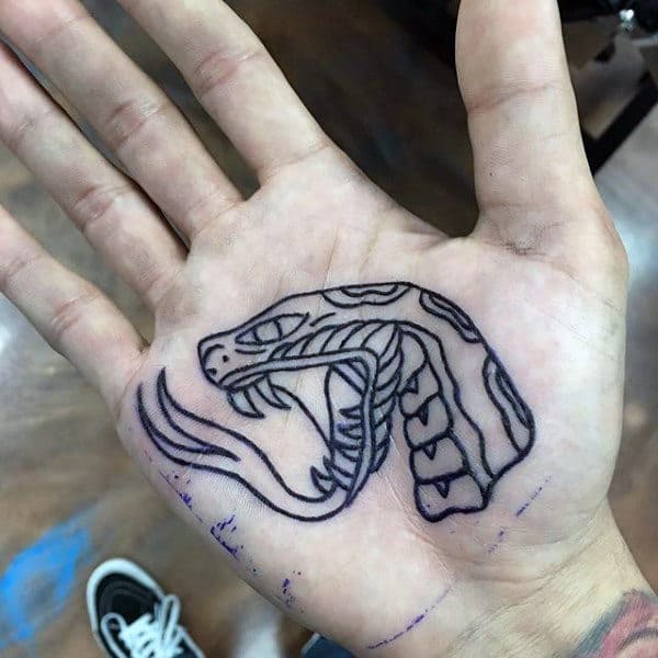 Man With Large Tongued Snake Tattoo On Palms
